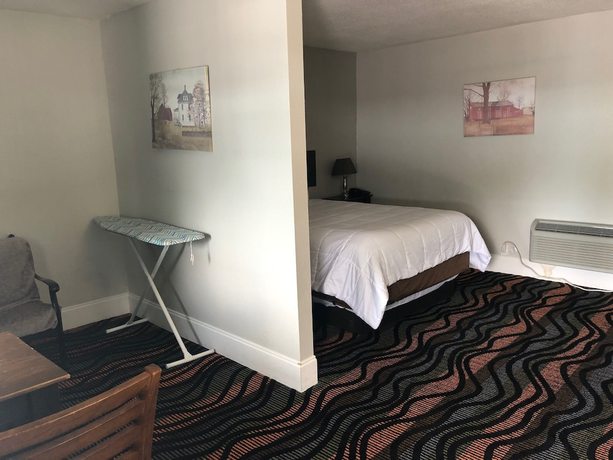 Imagen de la habitación del Hotel Country Town N Suites. Foto 18