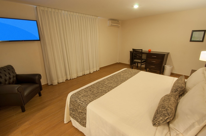 Imagen de la habitación del Hotel Country and Suites. Foto 6