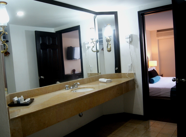 Imagen de la habitación del Hotel Country and Suites. Foto 9
