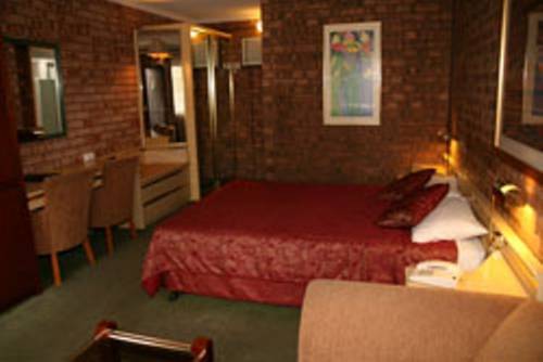 Imagen de la habitación del Hotel Countryman Motor Inn. Foto 2