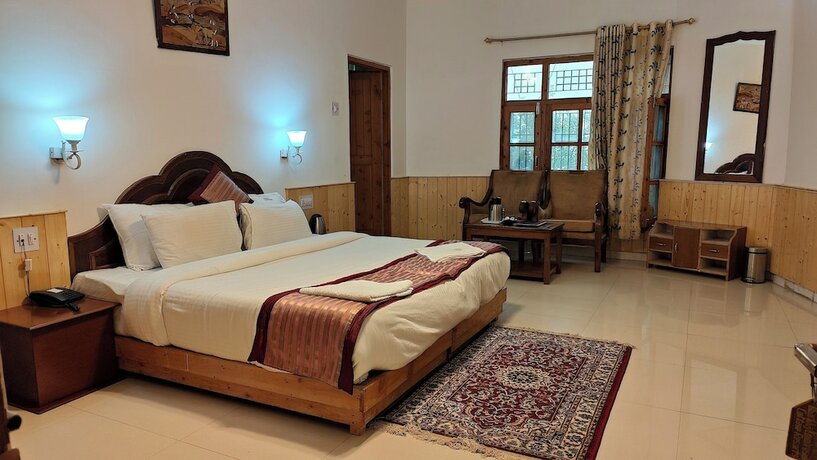 Imagen de la habitación del Hotel Countryside Himalayan Resort, Manali. Foto 16