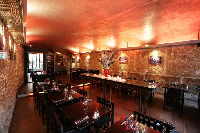 Imagen del bar/restaurante del Hotel Cour Des Loges Lyon, A Radisson Collection. Foto 1