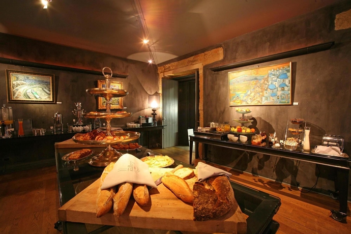 Imagen del bar/restaurante del Hotel Cour Des Loges Lyon, A Radisson Collection. Foto 4