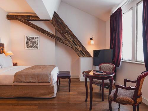 Imagen de la habitación del Hotel Cour Du Corbeau Strasbourg - Mgallery. Foto 5