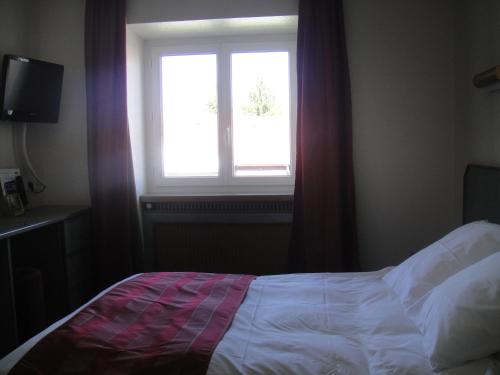 Imagen de la habitación del Hotel Cour Du Tonnelier. Foto 5