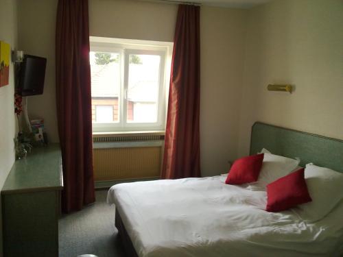 Imagen de la habitación del Hotel Cour Du Tonnelier. Foto 7