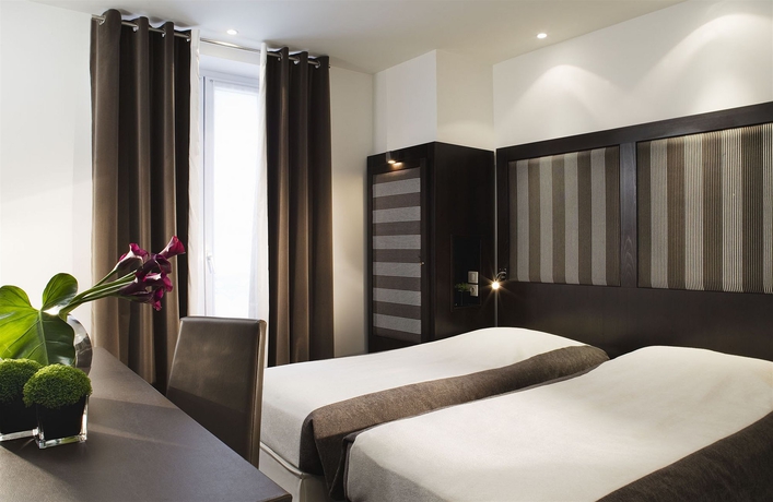 Imagen de la habitación del Hotel Courcelles Étoile. Foto 7