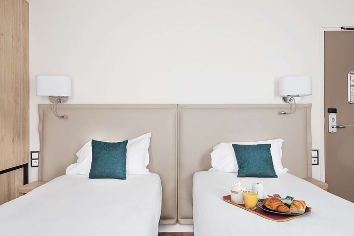 Imagen de la habitación del Hotel Courcelles Médéric. Foto 16