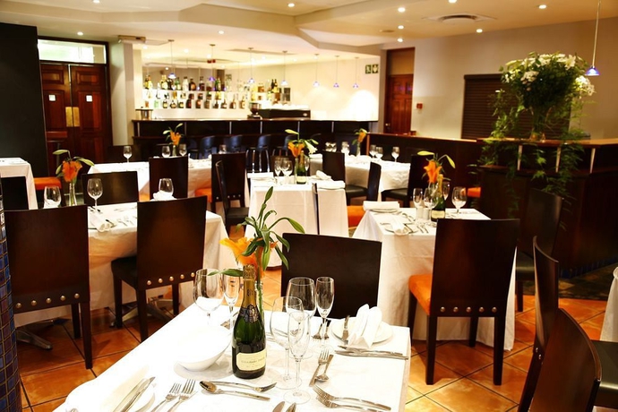 Imagen del bar/restaurante del Hotel Court Classique Suite. Foto 4