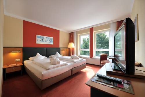 Imagen de la habitación del Hotel Court. Foto 10