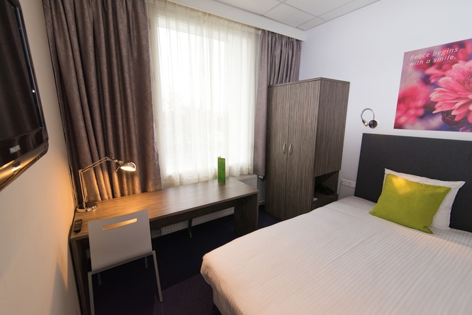 Imagen de la habitación del Hotel Court Garden. Foto 7