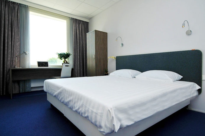 Imagen de la habitación del Hotel Court Garden. Foto 8