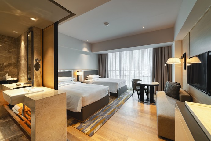 Imagen de la habitación del Hotel Courtyard By Marriott Ahmedabad Sindhu Bhavan Road. Foto 9