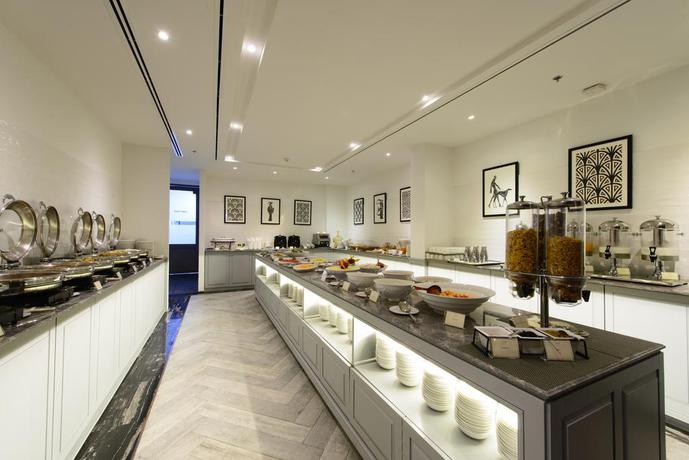 Imagen del bar/restaurante del Hotel Courtyard By Marriott Bangkok Sukhumvit 20. Foto 4