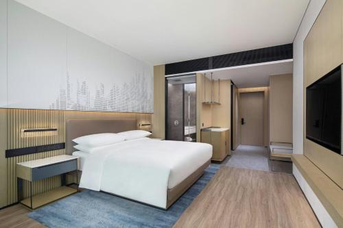 Imagen de la habitación del Hotel Courtyard By Marriott Beijing Changping. Foto 9