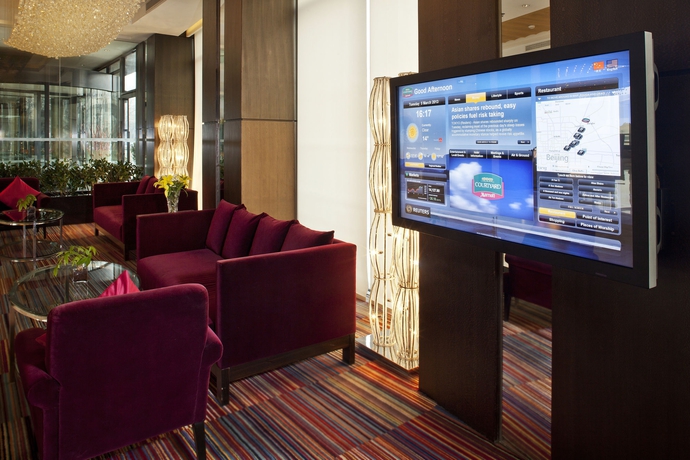 Imagen de los interiores del Hotel Courtyard By Marriott Beijing Northeast. Foto 16