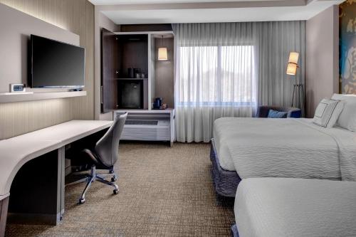 Imagen de la habitación del Hotel Courtyard By Marriott Carrollton. Foto 13