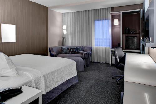Imagen de la habitación del Hotel Courtyard By Marriott Carrollton. Foto 16