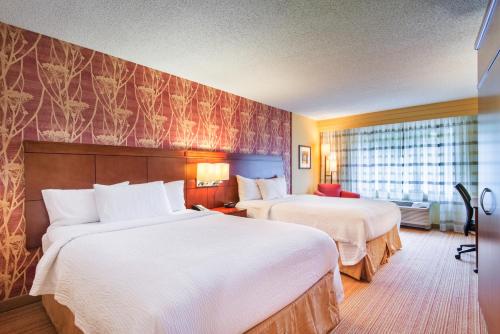 Imagen de la habitación del Hotel Courtyard By Marriott Charlotte Airport/billy Graham Parkway. Foto 7
