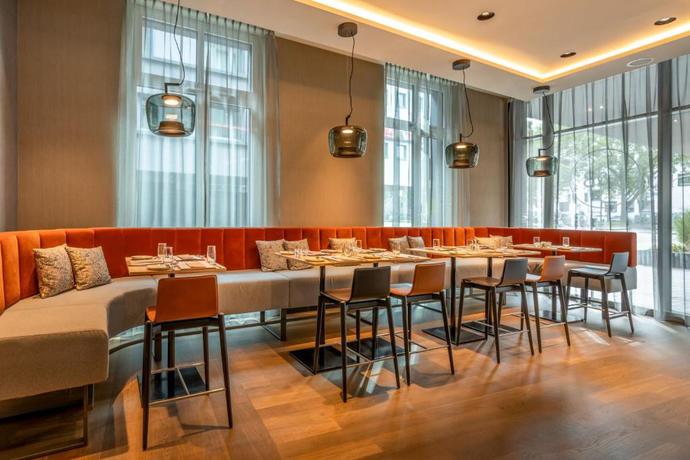 Imagen del bar/restaurante del Hotel Courtyard By Marriott Cologne. Foto 3