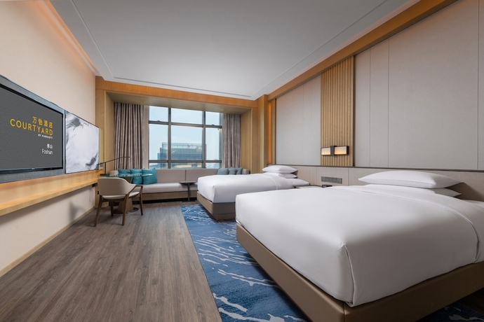 Imagen de la habitación del Hotel Courtyard By Marriott Foshan. Foto 3