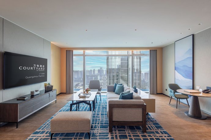 Imagen de la habitación del Hotel Courtyard By Marriott Guangzhou Pazhou. Foto 12