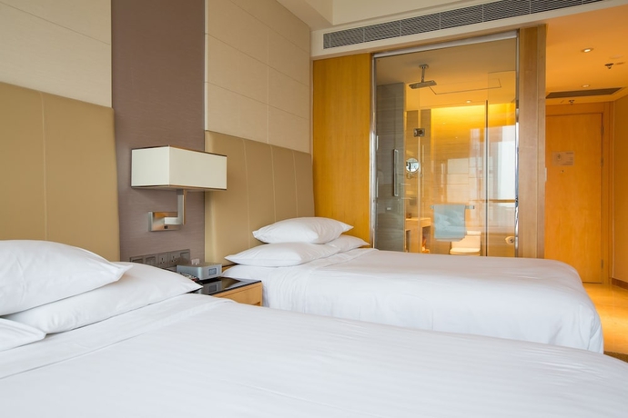 Imagen de la habitación del Hotel Courtyard By Marriott Hangzhou Qianjiang. Foto 12