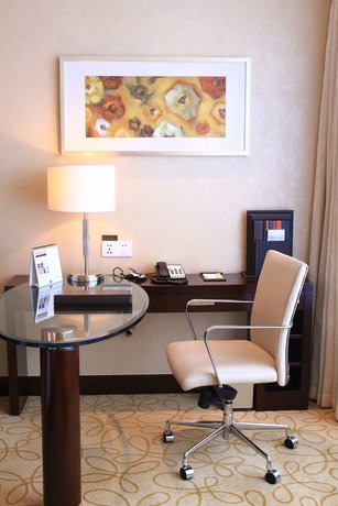 Imagen de la habitación del Hotel Courtyard By Marriott Hangzhou Wulin. Foto 8