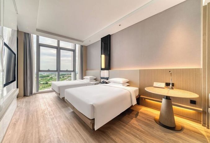 Imagen de la habitación del Hotel Courtyard By Marriott Hangzhou Xihu. Foto 8