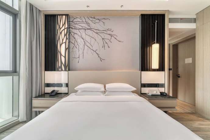 Imagen de la habitación del Hotel Courtyard By Marriott Hangzhou Xihu. Foto 13