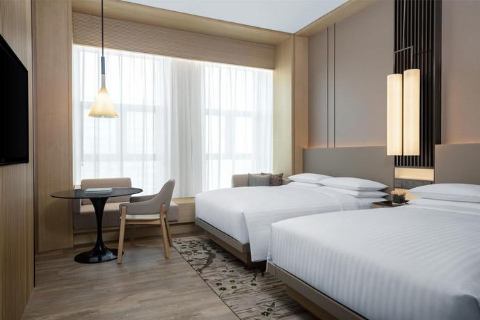 Imagen de la habitación del Hotel Courtyard By Marriott Jiangsu Taizhou. Foto 6