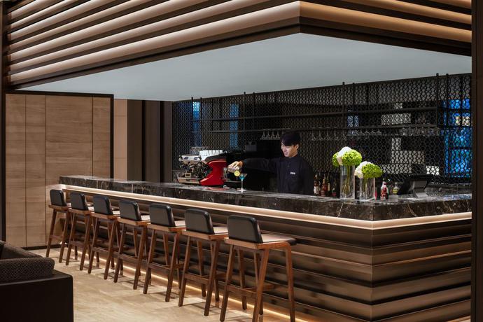 Imagen del bar/restaurante del Hotel Courtyard By Marriott Jiangsu Taizhou. Foto 4