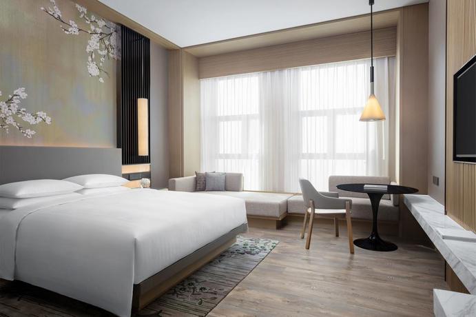 Imagen de la habitación del Hotel Courtyard By Marriott Jiangsu Taizhou. Foto 9