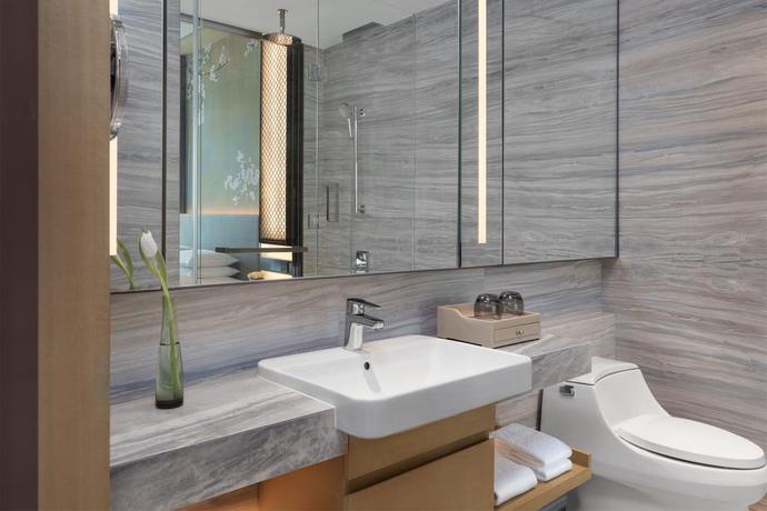 Imagen de la habitación del Hotel Courtyard By Marriott Jiangsu Taizhou. Foto 10