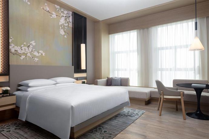 Imagen de la habitación del Hotel Courtyard By Marriott Jiangsu Taizhou. Foto 11