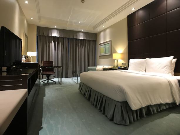 Imagen de la habitación del Hotel Courtyard By Marriott Kunshan. Foto 8