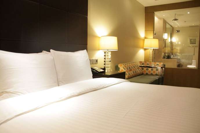 Imagen de la habitación del Hotel Courtyard By Marriott Kunshan. Foto 16