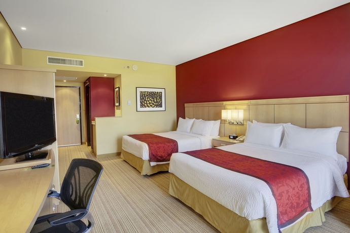 Imagen de la habitación del Hotel Courtyard By Marriott Leon At The Poliforum. Foto 7