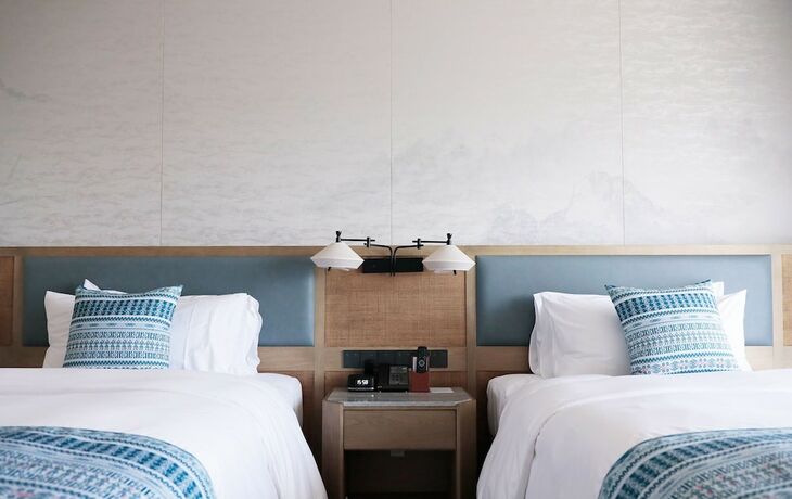 Imagen de la habitación del Hotel Courtyard By Marriott Liuzhou Sanjiang. Foto 12