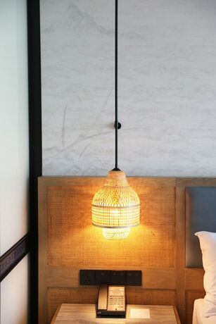 Imagen de la habitación del Hotel Courtyard By Marriott Liuzhou Sanjiang. Foto 14