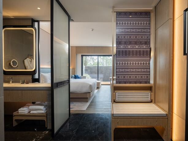 Imagen de la habitación del Hotel Courtyard By Marriott Liuzhou Sanjiang. Foto 17