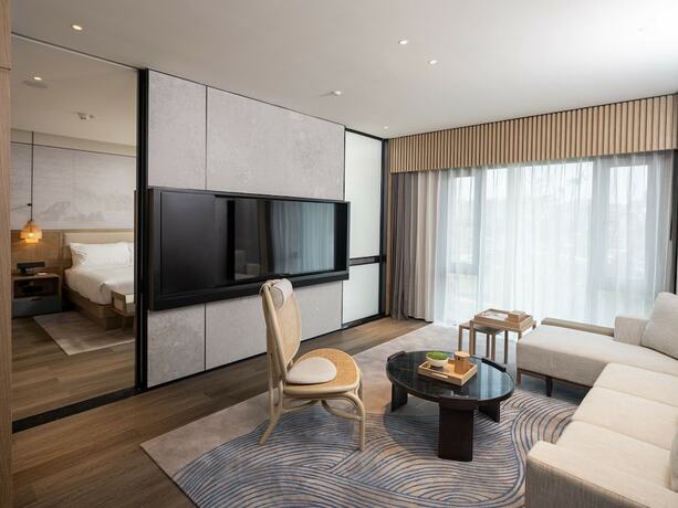 Imagen de la habitación del Hotel Courtyard By Marriott Liuzhou Sanjiang. Foto 20