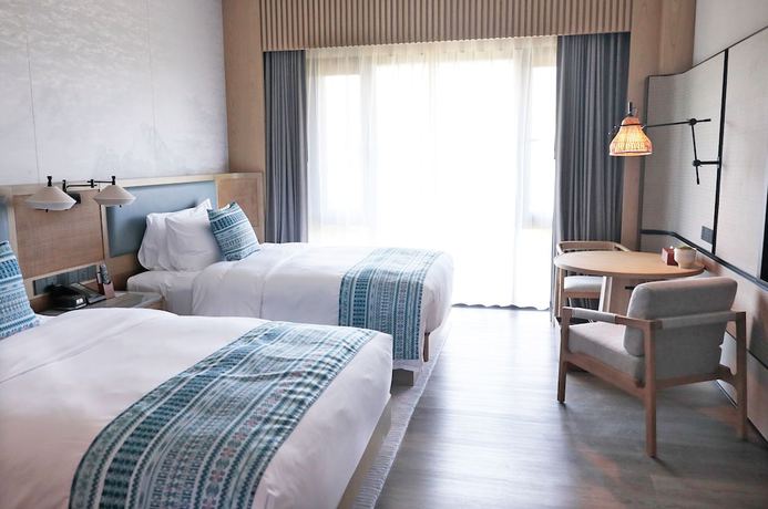 Imagen de la habitación del Hotel Courtyard By Marriott Liuzhou Sanjiang. Foto 6
