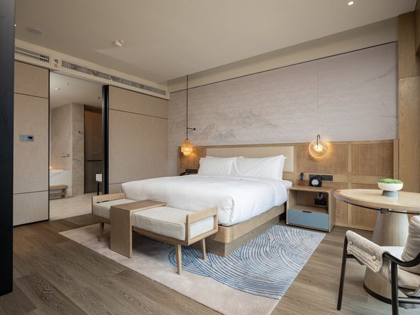 Imagen de la habitación del Hotel Courtyard By Marriott Liuzhou Sanjiang. Foto 12