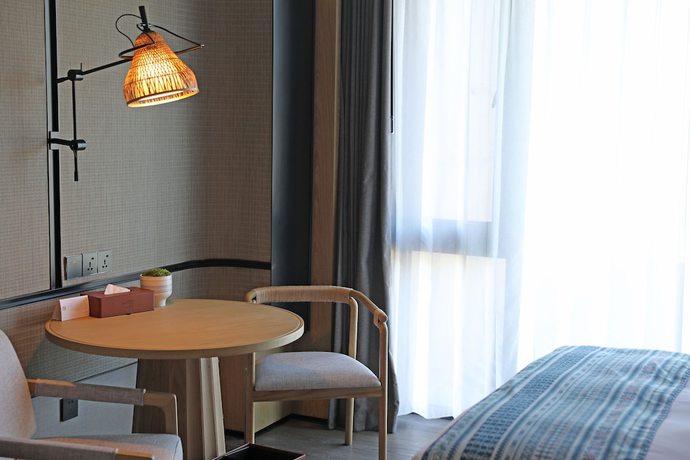 Imagen de la habitación del Hotel Courtyard By Marriott Liuzhou Sanjiang. Foto 15