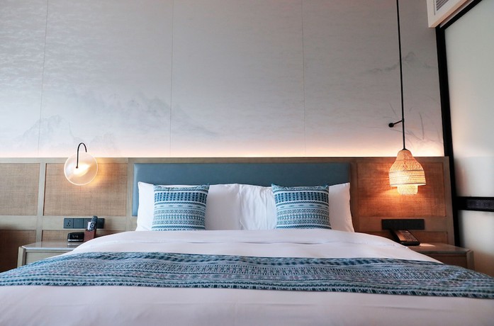 Imagen de la habitación del Hotel Courtyard By Marriott Liuzhou Sanjiang. Foto 17