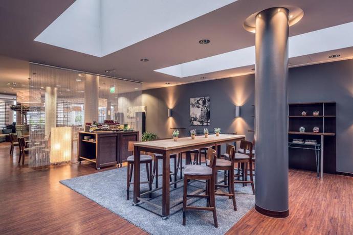 Imagen de los interiores del Hotel Courtyard By Marriott Munich City Center. Foto 12