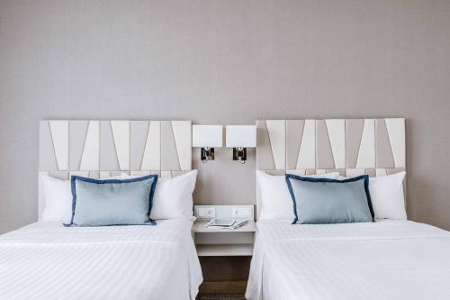 Imagen de la habitación del Hotel Courtyard By Marriott Munich City Center. Foto 12