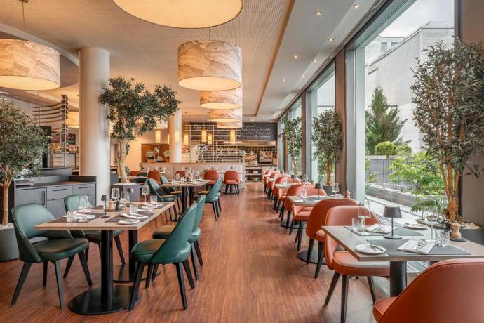 Imagen del bar/restaurante del Hotel Courtyard By Marriott Munich City Center. Foto 3