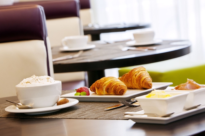 Imagen del bar/restaurante del Hotel Courtyard By Marriott Nizhny Novgorod City Center. Foto 2